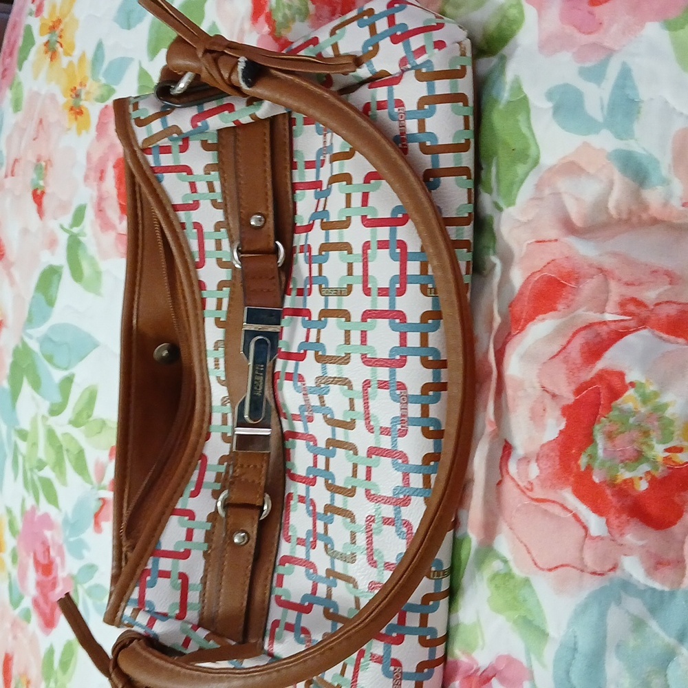Like new rosetti hand bag